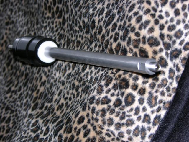 stainless tip, copper coil, aluminum shaft, stainless allthread in bottom. shrink tubing over copper wrapped around solid delrin insulator.