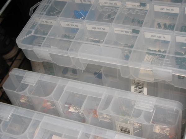 The file cabinets are filled with these well organized & labeled boxes of resistors, caps, diodes, transistors, etc.