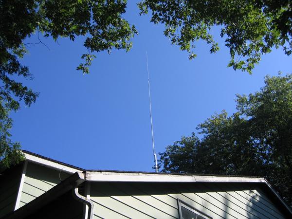 The Imax 2000. You can't see the 10 foot mast at this angle. House is 25 foot at the crest. 10' mast + 24' antenna=59' total height.