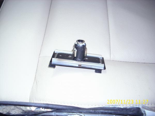 This the the "MB-62" remote mounting bracket. I cut the end off of a cell-phone charger that had really good spring-loaded friction expanders and fill