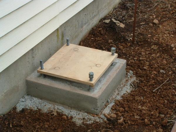 tip of the iceberg, dirt covering most of the concrete.