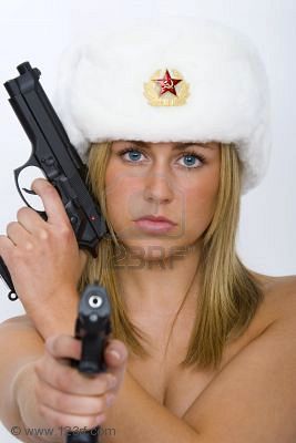 553158-a-beautiful-blonde-russian-woman-armed-and-dangerous-wearing-a-fur-hat-and-not-much-else.jpg